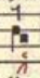 Une clivis : deux notes reliées, mouvement descendant, signalée par une flèche, ici sur « -li- » de « filius », Graduale Triplex p. 47